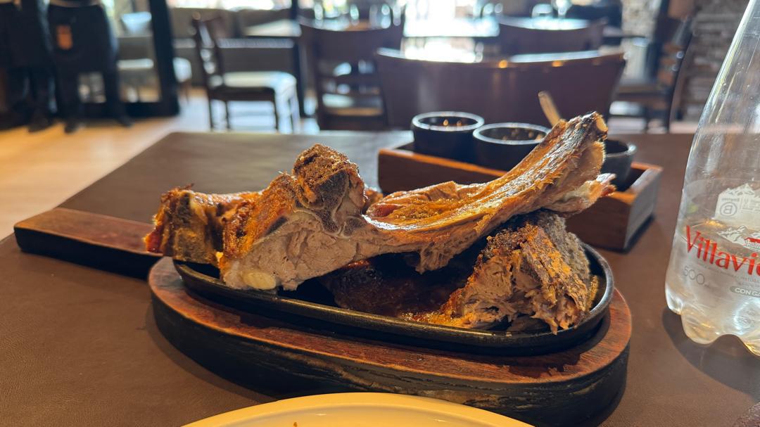 A traditional Patagonian asado of spit-roasted lamb