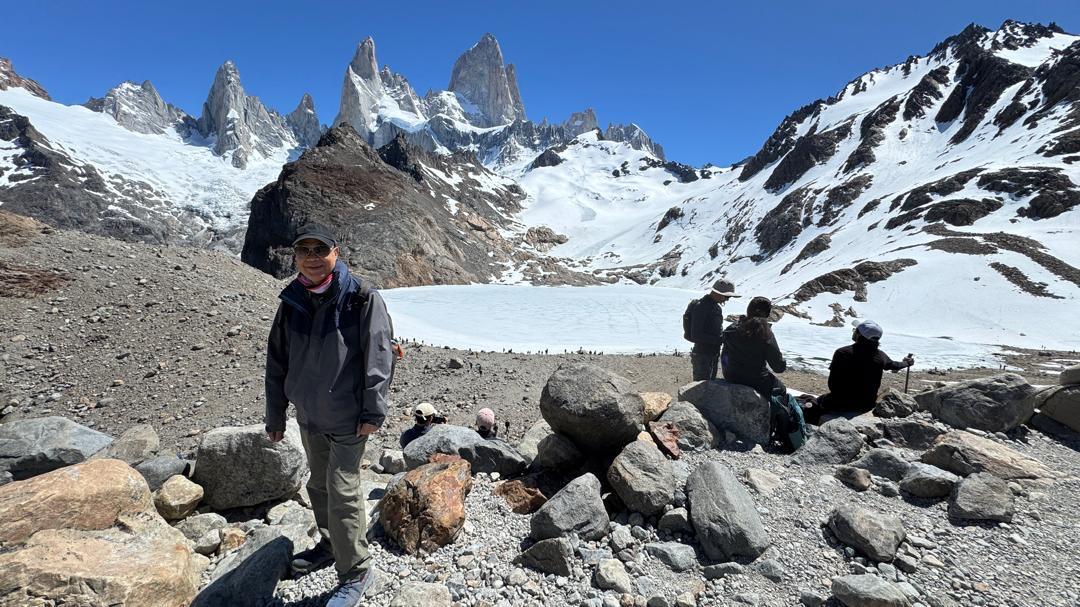 Travellers at a mountain viewpoint in Patagonia