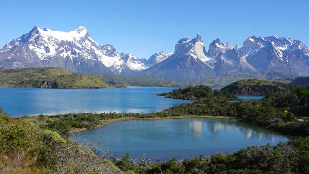 The Torres del Paine massif reflected in a lake in Chilean Patagonia